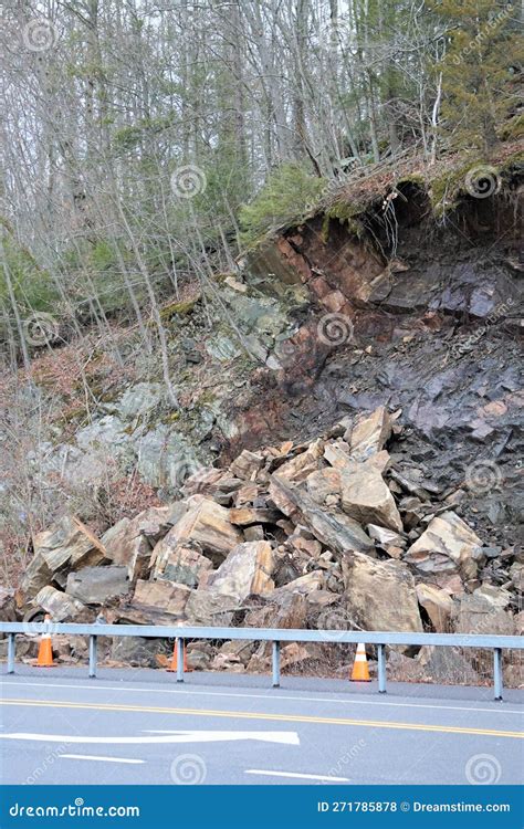 Natural Hazard Small Scale Rockslide On Pedestrial Walkway And Barrier