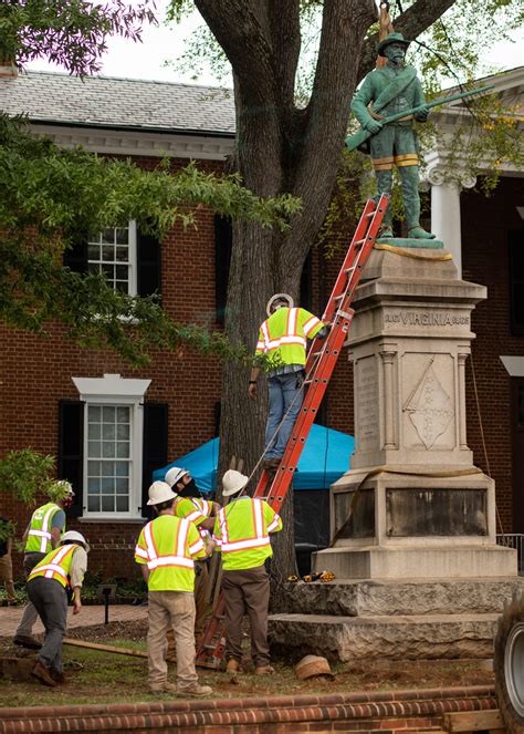 Photos: Albemarle County removes ‘Johnny Reb’ statue Saturday