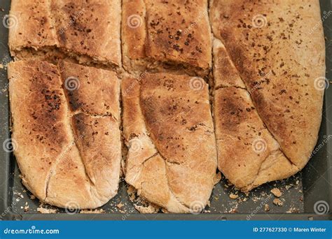 Freshly Baked Bread From Wheat And Whole Meal Flour With Yeast On A