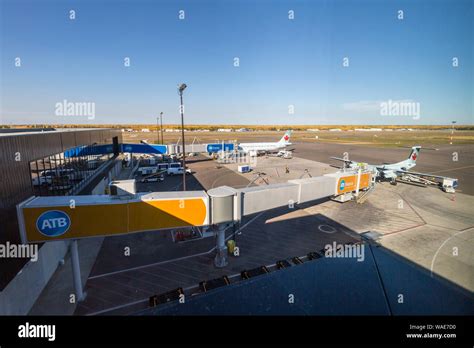 Passenger ramps at Fort McMurray International Airport Stock Photo - Alamy