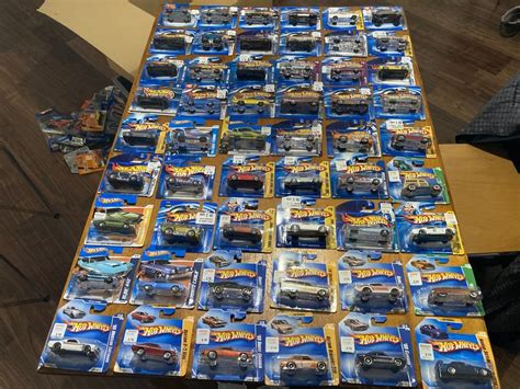 Grosse SammlungNr v on Hot Wheels Modellautos OVP Neu gemäss