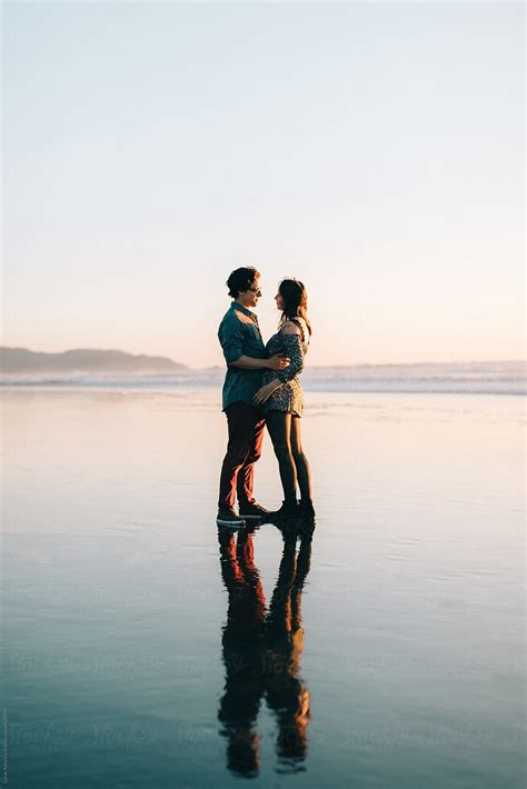 Sunset Walk On The Beach By Stocksy Contributor Lukas Korynta Stocksy