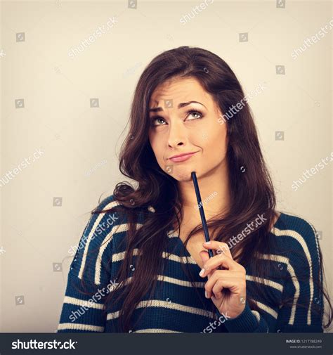 Confusion Grimacing Brunette Woman Thinking Looking Stock Photo Shutterstock