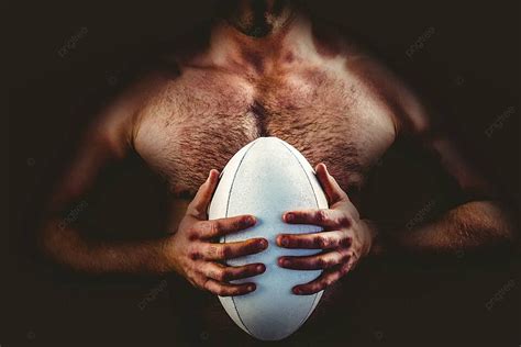 Shirtless Rugby Player Holding Ball Athlete Ready Sport Photo