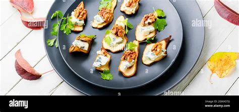 Dry Pear Blue Cheese And Walnut Appetizer Seasonal Snack Stock Photo