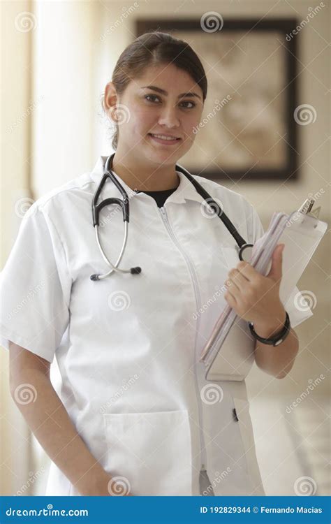 Portrait Of Friendly Smiling Female Doctor Healthcare Professional