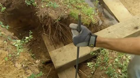 How to Build a Retaining Wall with Landscape Timbers - Forestry Reviews