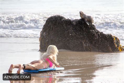 Angelique Morgan Sexy In A Pink Bikini On Malibu Beach Showing Off Her Bodyboarding Skills AZNude