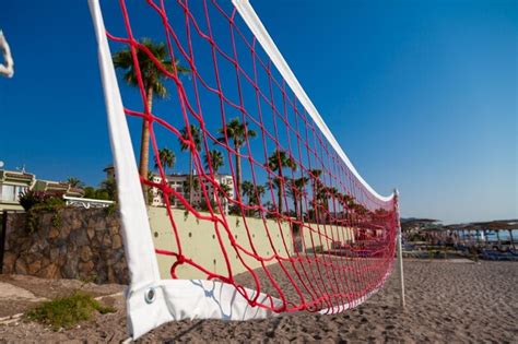 Premium Photo Red Volleyball Net On A Tropical Beach Against The