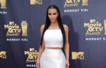 Kim Kardashian Uses Itsy Bitsy Bikini And Leather Gloves To Send Cryptic Message On Instagram