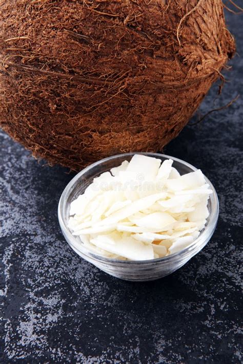 Coconut Flakes with Whole Coconut. Tropical Food Concept Stock Photo ...