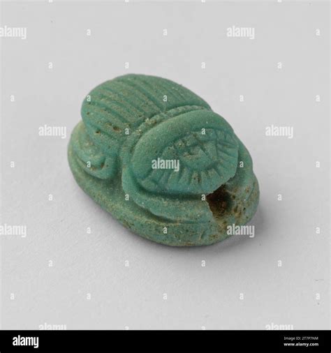 Ancient egyptian faience scarab amulet Stock Photo - Alamy