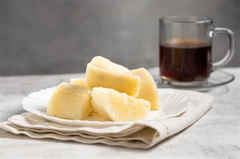 Premium Photo Cooked Cassava Served On Plate On The Table