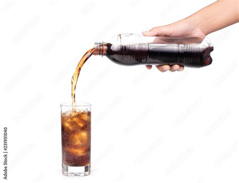 Pouring Coca Cola Splash Into Glass Isolated On White Background Stock