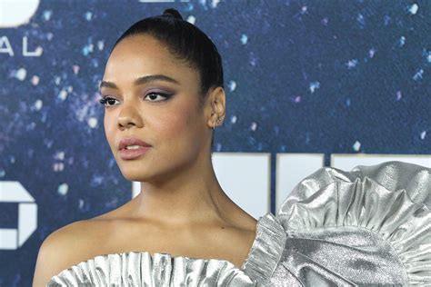 Tessa Thompson Stuns In Silver At Men In Black Premiere