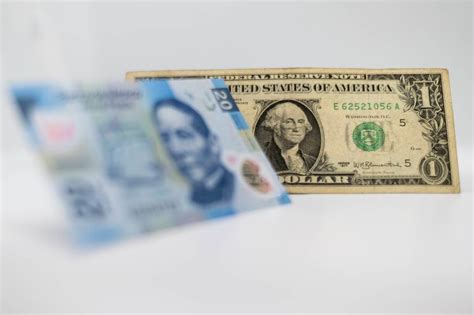 El peso mexicano se deprecia frente al dólar y se cotiza en 16 86 por