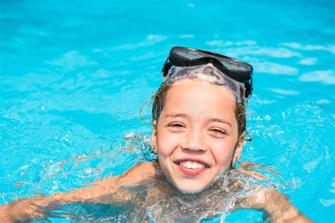 Pretty Young Girl In The Water Portrait Of Smiling Kid In Swimming