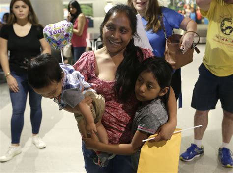Tearful reunion in Miami for mom, daughter separated at border