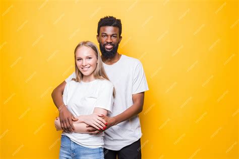 Free Photo Portrait Of Romantic Multiracial Couple Embracing Posing