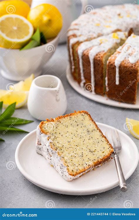 Lemon Poppy Seed Pound Cake With Powdered Sugar Glaze Stock Photo