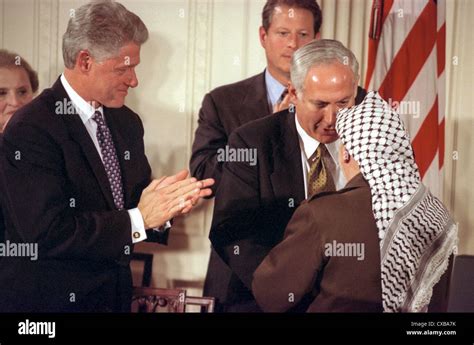 Israel Prime Minister Benjamin Netanyahu Shakes Hands With Palestinian Leader Yasser Arafat As