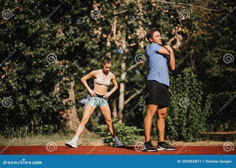 Active Friends Embrace The Outdoors For A Positive Fitness Routine