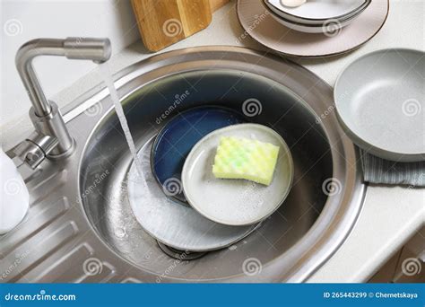 Washing Plates and Sponge in Kitchen Sink Stock Image - Image of dishes ...