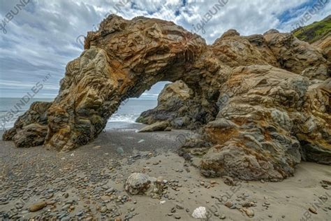 Majestic Natural Sea Arch On Rocky Beach