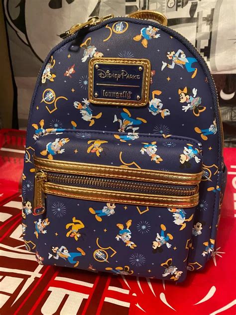 PHOTOS 50th Anniversary EARidescent Loungefly Backpack 42 OFF