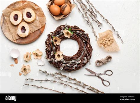Composition With Beautiful Easter Wreath Pussy Willow Branches Eggs