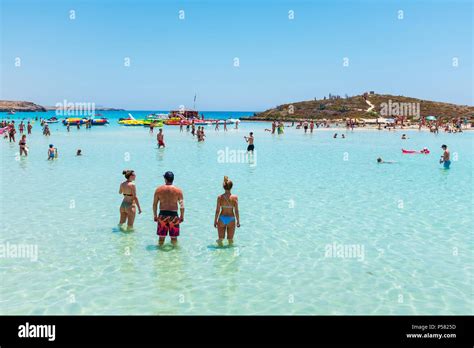 Tourists Bathing In The Mediterranean At Nissi Beach Resort Near Ayia