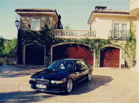 Black Sedan Parked During Daytime Hd Wallpaper Wallpaper Flare