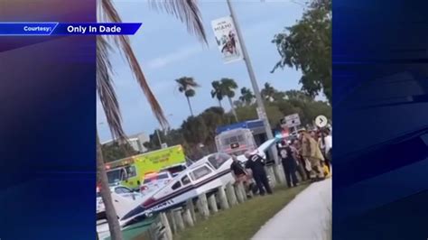 Entrance To Rickenbacker Causeway Reopens After Small Plane Makes Emergency Landing Hits Bus