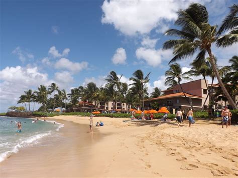 On Poipu Beach and a view of the Waiohai Marriott Beach Club resort | Beach club resort, Kauai ...