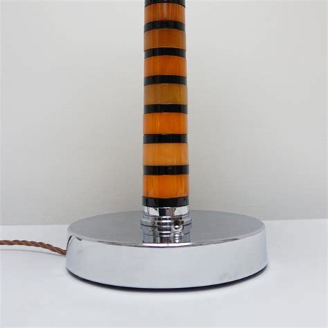 An Art Deco Chromed Metal Orange Bakelite Table Lamp For Sale At 1stdibs