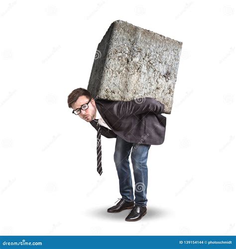 Businessman Carrying A Large And Heavy Stone On His Back Stock Photo