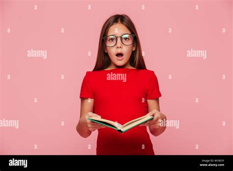 Surprised Brunette Girl Nerd In Eyeglasses Looking Camera With Opened