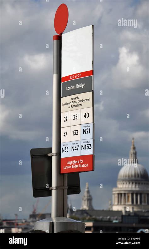 Bus Stop In London Uk By London Bridge St Pauls Cathedral Can Be Seen