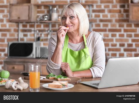 Mature Woman Cooking Image Photo Free Trial Bigstock