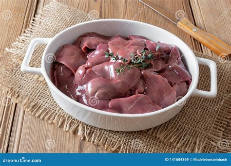 Fresh Raw Chicken Livers In A White Baking Dish Stock Image Image Of