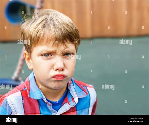 Closeup portrait of a baby boy making a funny face Stock Photo - Alamy