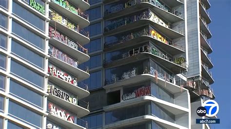 Suspected Taggers Arrested For Graffiti At Vacant High Rise Building Near Arena