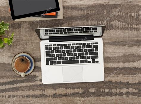 Laptop on working desk Stock Photo by ©Goir 117651214