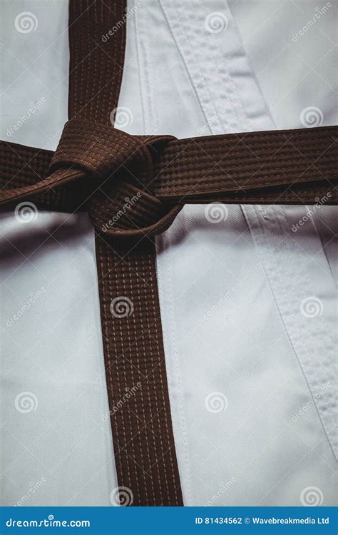 Karate Uniform and Brown Belt Stock Photo - Image of power, champion ...