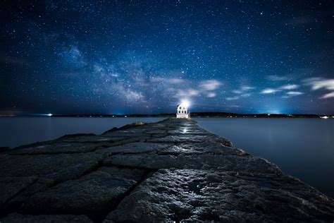 HD Wallpaper Of A Majestic Man Made Lighthouse Under The Stars