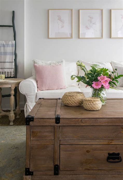 White Slipcovered Sofa And Neutral Wall Decor The Honeycomb Home