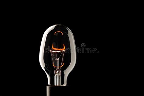 Light bulb on black stock photo. Image of glare, closeup - 10090512