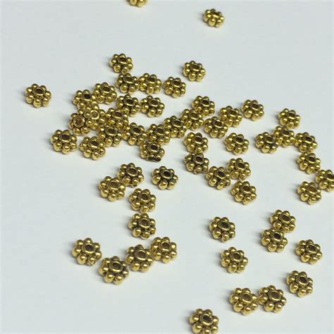 Daisy Spacer Antique Gold Mm