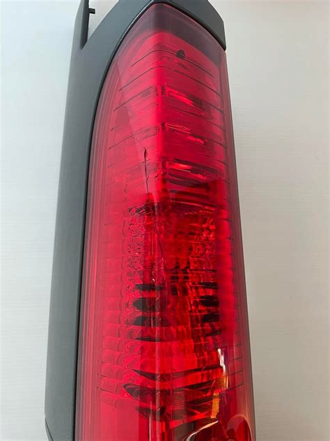 LAMPA LEWY TYŁ RENAULT TRAFIC II VIVARO ORYG 11981093207