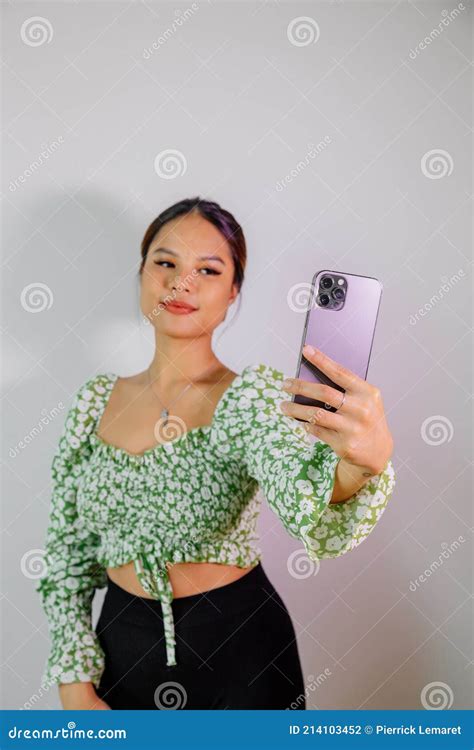 Pretty Asian Girl Take A Self Portrait With Her Smart Phone Thai Girl